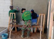 Personel Lanud Atang Sendjaja Lanjutkan Pembangunan Rutilahu dalam Program TMMD Ke-129 di Cianjur